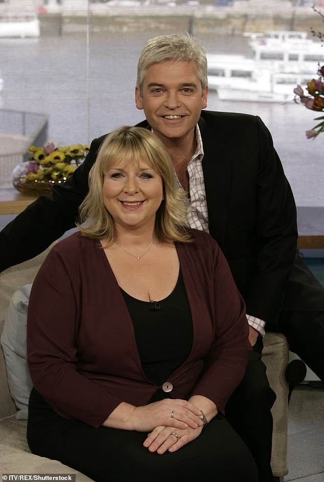 Early years: Phillip joined This Morning in 2002 where he co-hosted alongside Fern Britton for seven years (pictured with Fern in 2005)