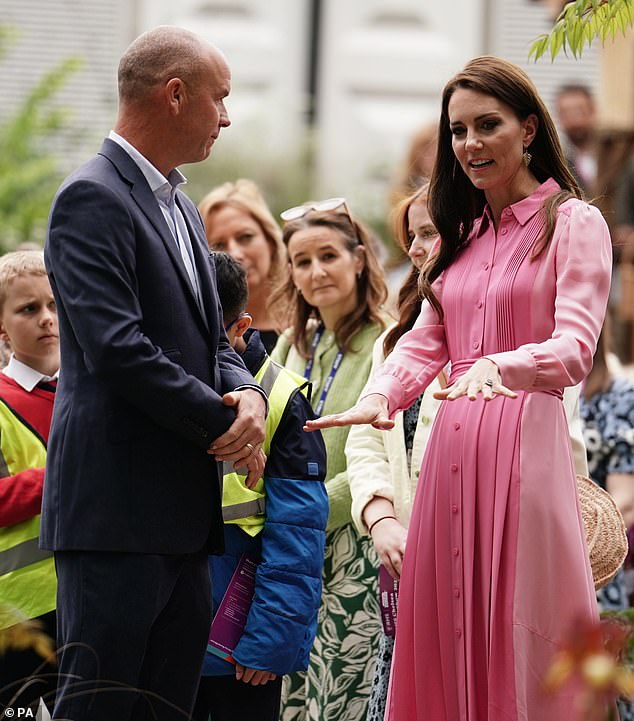 Kate (pictured right) wore a silk ME+EM shirt dress, which her mother Carole has also worn previously, for today's occasion