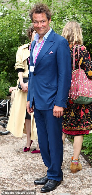Working it: Dominic West poses up a storm as he attends the Chelsea Flower Show on Monday