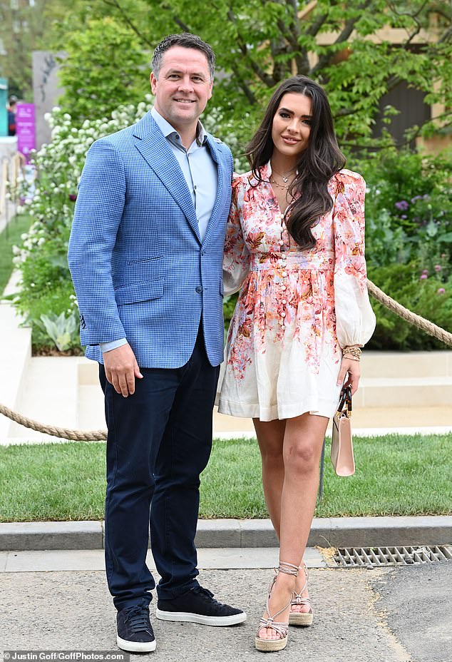 Dad and daughter day: Gemma Owen, 20, and her father Michael Owen, 43, attended the Chelsea Flower Show at The Royal Hospital in London, on Monday