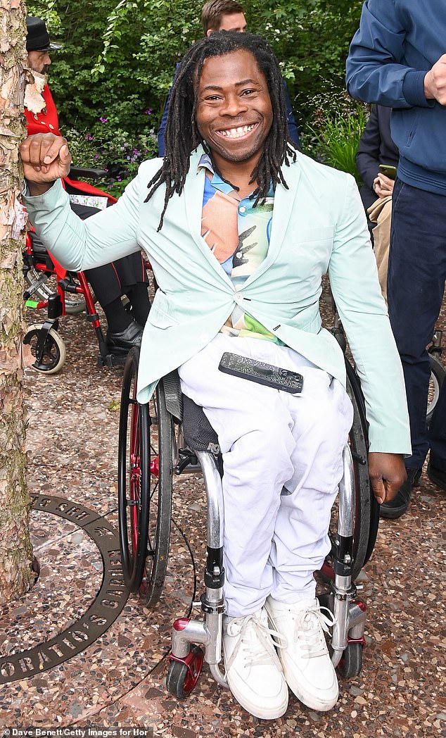 Looking smart! Ade Adepitan poses up a storm when attending the Chelsea Flower Show 2023