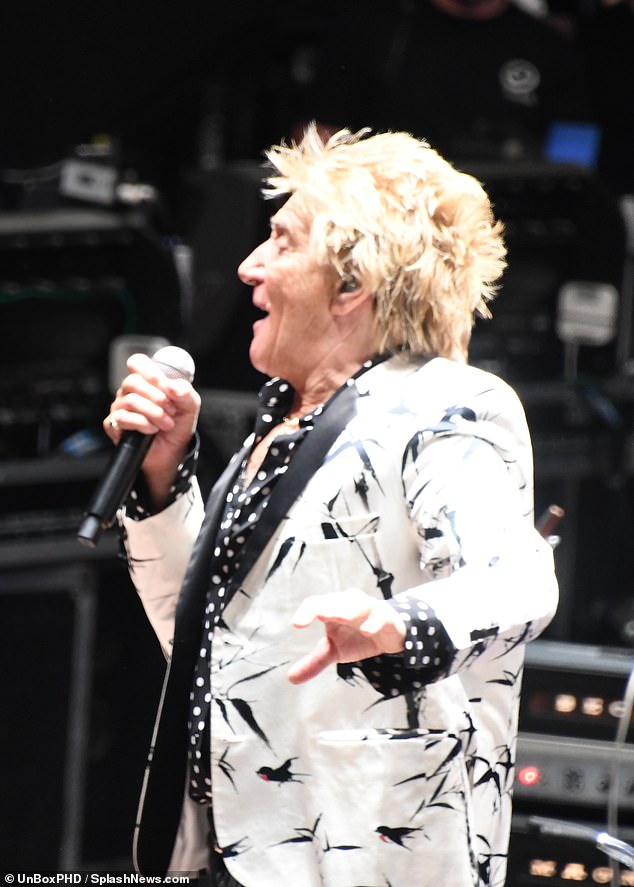Hitting the high notes: Rod was pictured giving an energetic show