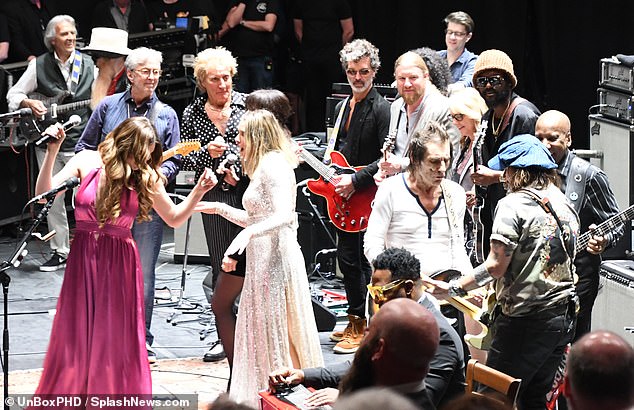 Stage full of stars: Rolling Stones legend Ronnie Wood, 75, was also among those who performed