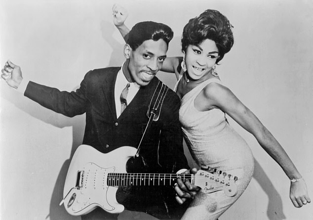 Tina Turner and her first husband Ike pose for a promotional photo in 1961. The singer had begun having her hair straightened like other Motown stars