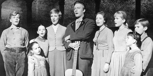 The actors playing members of the Von Trapp family in a promotional portrait for The Sound Of Music,