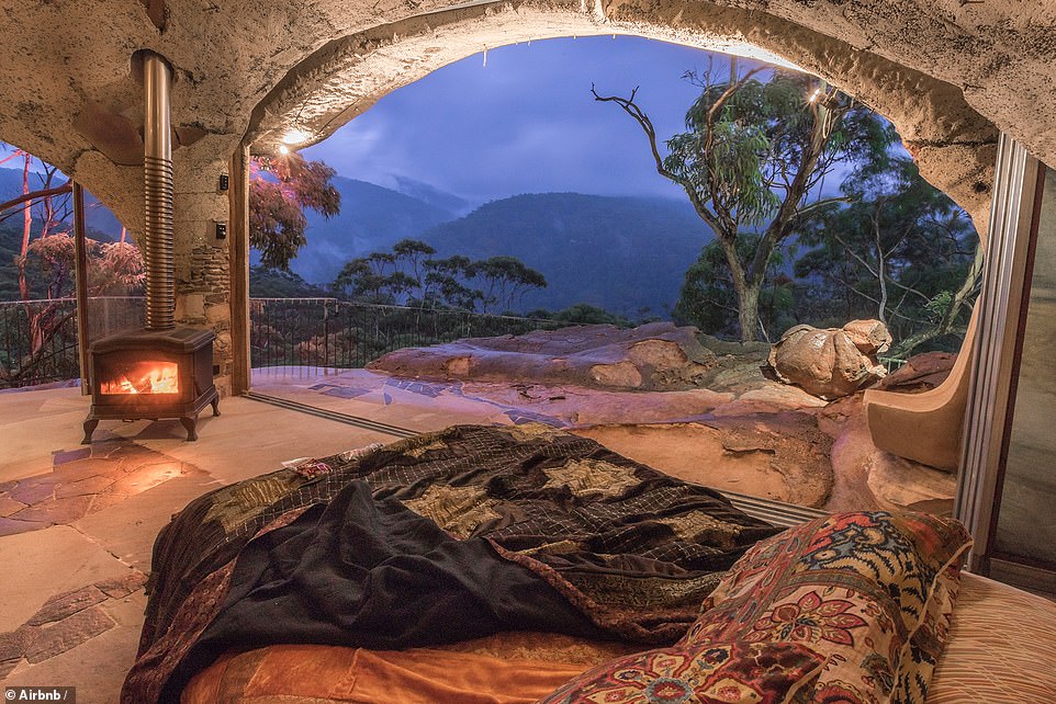 ‘ENCHANTED CAVE’ AIRBNB, NEAR BILPIN, NEW SOUTH WALES: Take in dreamy views of Australia’s Blue Mountains from this quirky Airbnb, which has been built into the top of a natural rock platform near the town of Bilpin. To enter, guests walk through a round wooden door that ‘wouldn't be out of place’ in Hobbiton, a filming location for The Lord of the Rings trilogy, the listing notes. Visit airbnb.co.uk
