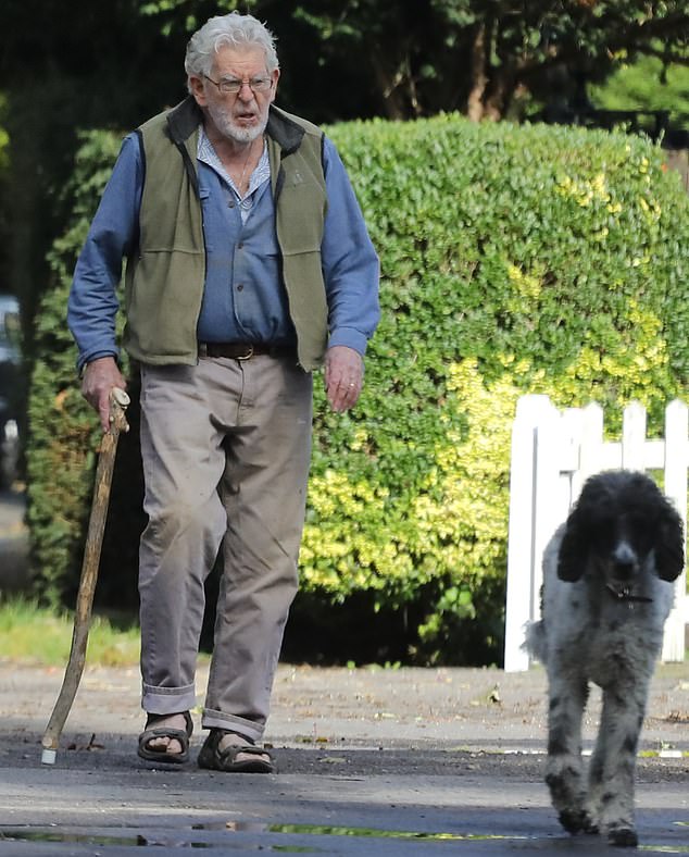 After being released from prison in May 2017, Harris (pictured walking his dog Bumble during lockdown) largely stayed out of public view