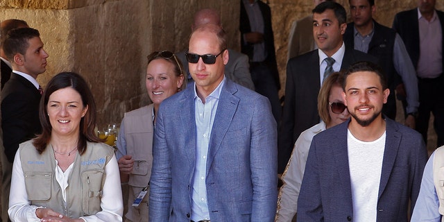 Prince William in a blue blazer and light blue shirt
