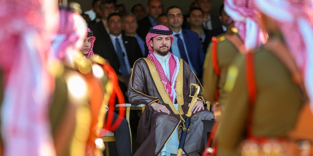 Crown Prince Hussein in royal regalia