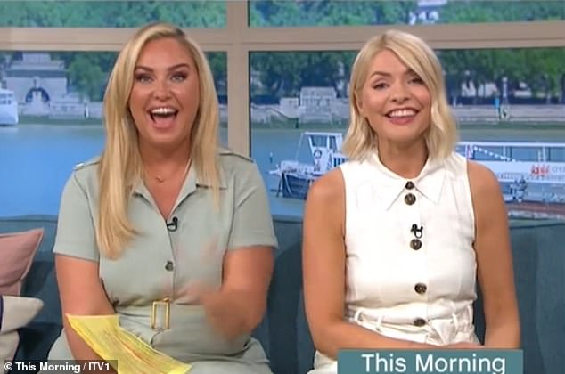 Wide smiles: Holly, 42, sitting alongside Josie Gibson, said: 'Let's find out what Loose Women are talking about today. Hi there, Ruth!'