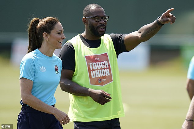 Top coaching! Kate appeared to be talking tactics with former rugby star Ugo Monye, who champions her Shaping Us campaign