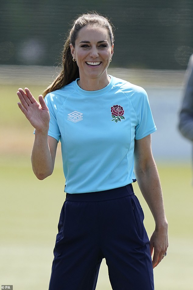 The Princess waved as she got stuck in on the pitch while she was in the middle of her training drills