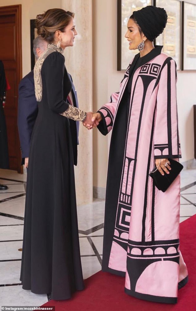 At the Jordanian wedding, she impressed in two stylish couture Valentino ensembles including a pink and black statement coat (pictured right)