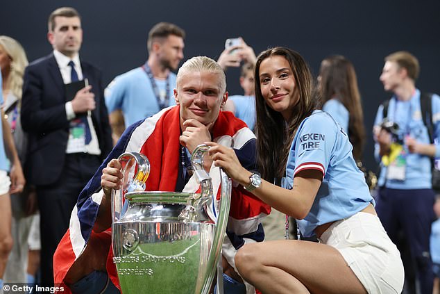 City¿s Norwegian striker Erling Haaland, 22, celebrated with his girlfriend Isabel Johansen, 19