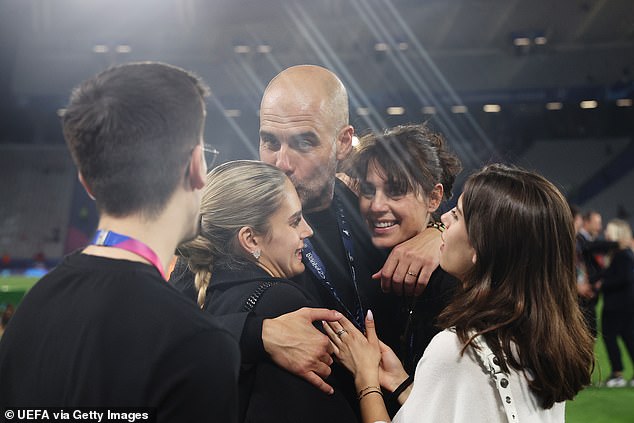 Pep Guardiola celebrates with his wife Cristina Serra and his daughter Maria Guardiola