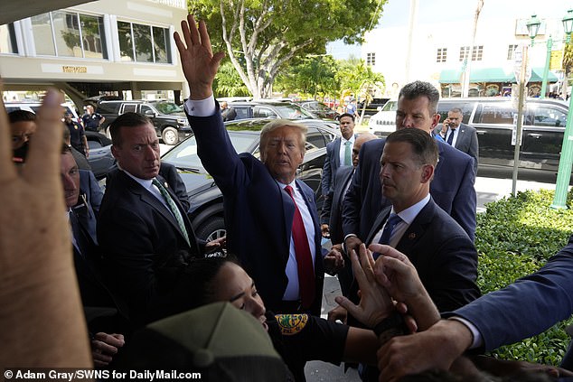 The former president is seen exiting Versailles after he made a surprise stop to the Cuban stop after spending time in federal court and being charged with 37 crimes over his mishandling of classified documents after departing the White House