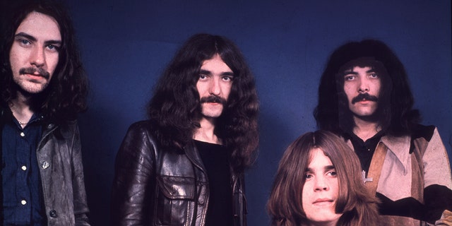 Black Sabbath-Mitglieder posieren