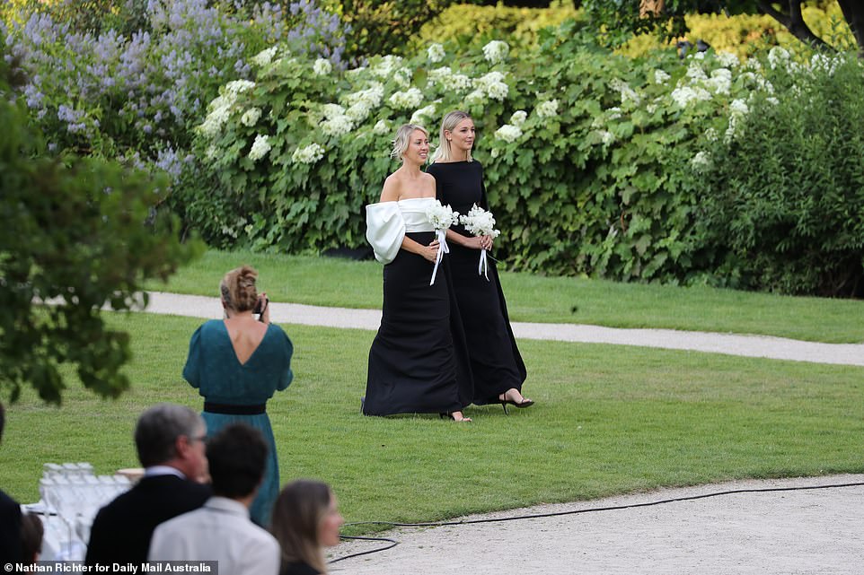 Jasmine looked stunning as a bridesmaid in an all black gown