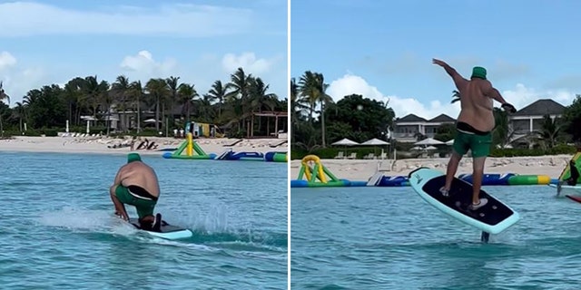 DJ Khaled trägt beim Surfen auf den Turks- und Caicosinseln grüne Shorts