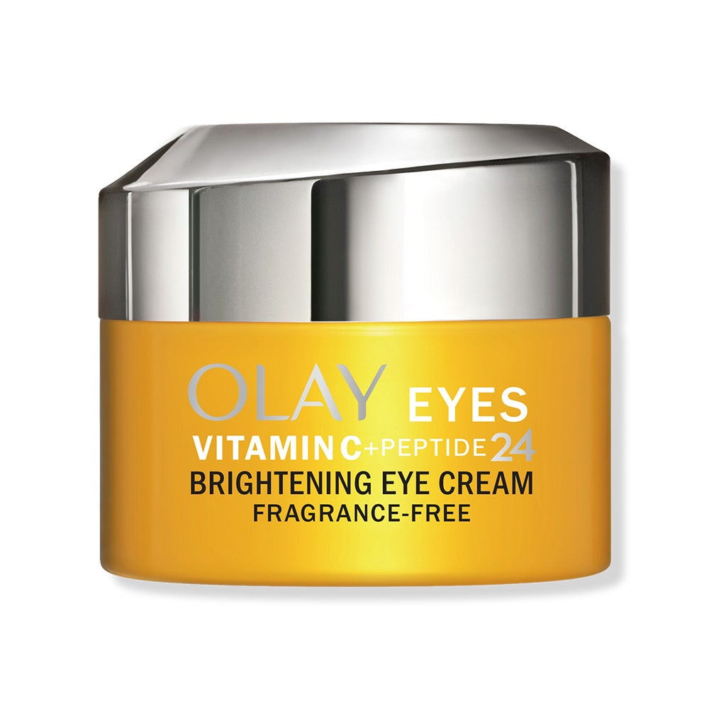 Ein kleines orangefarbenes und silbernes Glas Olay Vitamin C + Peptide 24 Eye Cream auf weißem Hintergrund