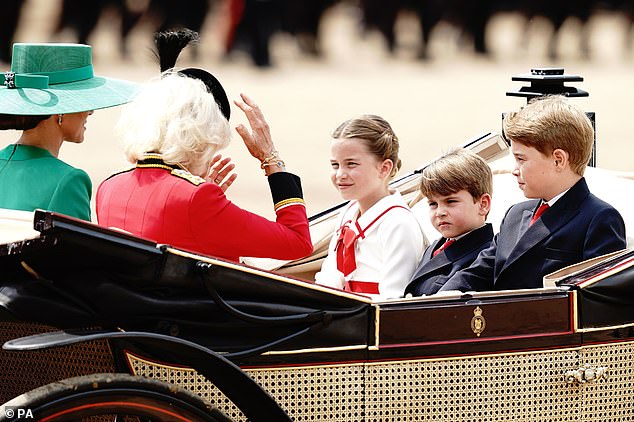 George, Charlotte and Louis will later take to the Buckingham Palace balcony for a flypast - after one set for the King's Coronation was scaled back in May