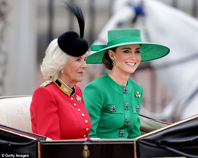 Camilla wore an outfit inspired by the grenadier guards, in bright red with a black headpiece