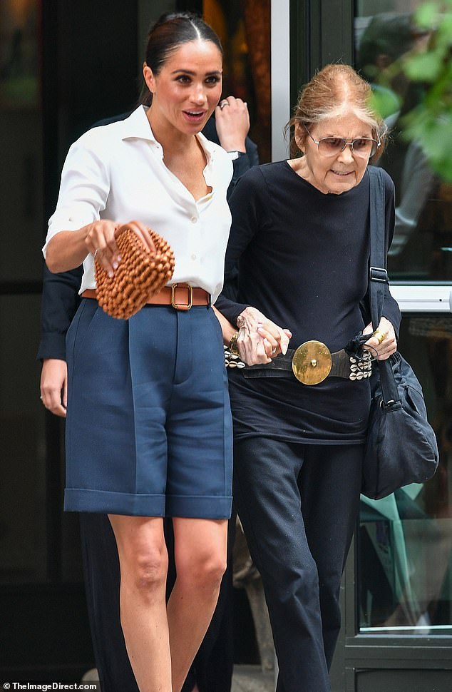 Meghan, 40, clutched the hand of her friend and fellow activist Gloria Steinem as they left Crosby Hotel after having lunch in July last year. She wore Dior shorts