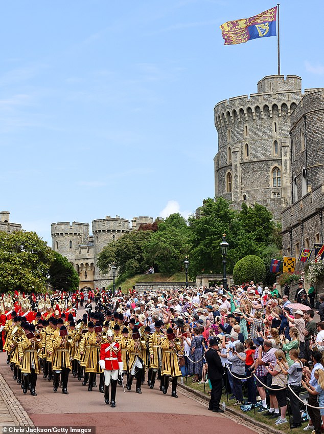 Pictured: The Band of the Household Cavalry play as well-wishers look on ahead of the Order Of The Garter Service at Windsor Castle