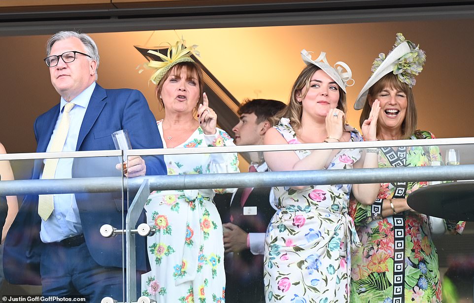 As Ed sipped on a glass of beer while Lorraine gave her opinion on the action, the Glaswegian television presenter's lookalike daughter, Rosie Smith, stood and watched the festivities