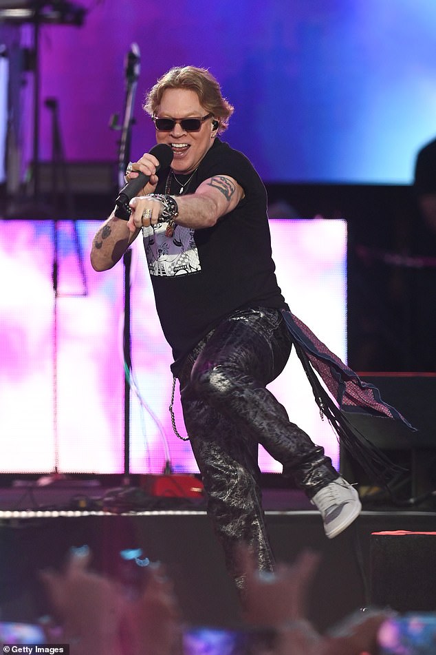 Fans: Axl Rose impressed his fans as he engaged with them and gestured out to the crowds during the set