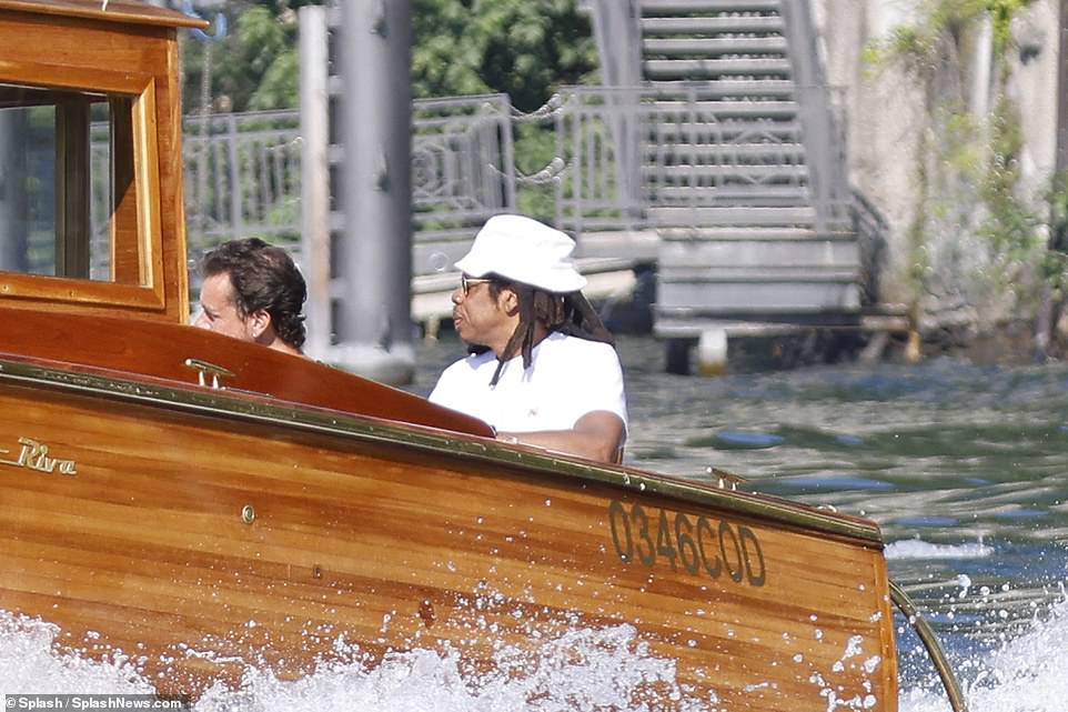 Luxury: Jay Z and Beyonce enjoyed a trip around Lake Como on a lavish boat with a group of their pals