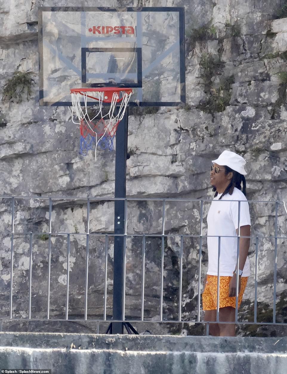 Game time! Jay Z was seen shooting some hoops before heading out to explore the sun-soaked location