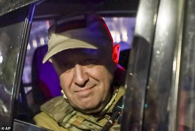 Yevgeny Prigozhin, the owner of the Wagner Group military company, looks out from a military vehicle on a street in Rostov-on-Don, Russia, on June 24, 2023. A private jet belonging to the Wagner warlord touched down in Belarus this morning