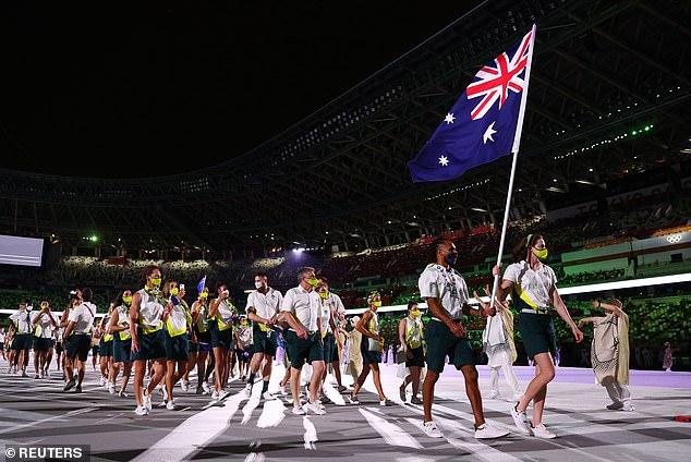 Australische Olympia-Athleten werden bei den Pariser Spielen im nächsten Jahr dank verstärkter Sicherheitsmaßnahmen vor potenziellen Drohnenangriffen und Cyber-Bedrohungen geschützt sein (im Bild: Australische Stars bei der Eröffnungszeremonie der Olympischen Spiele in Tokio)
