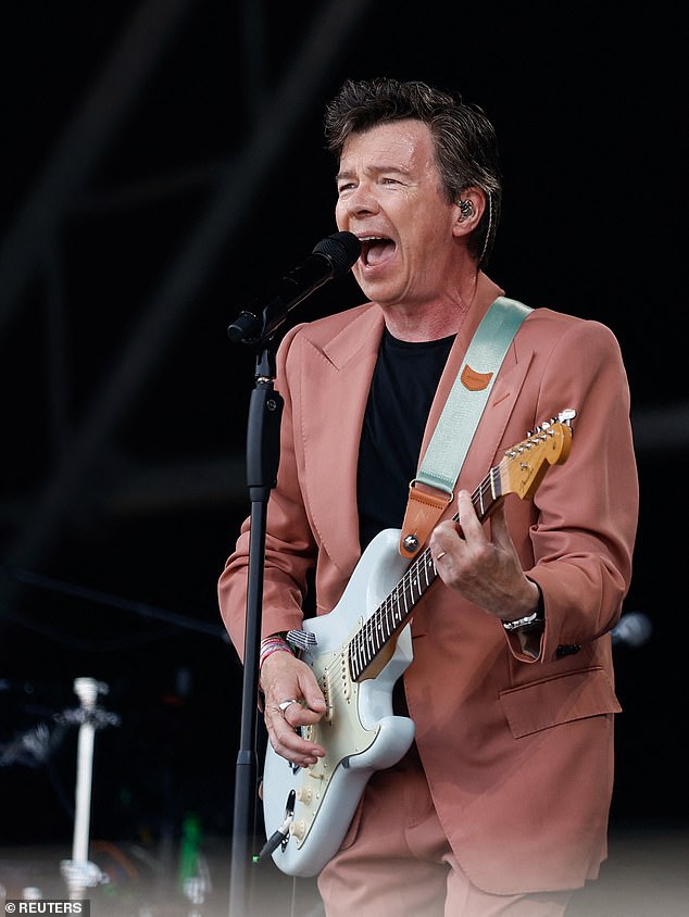 Sensational: Earlier in the day at Glastonbury, Rick Astley had wowed fans as he took to the Pyramid stage for an energetic performance earlier in the day