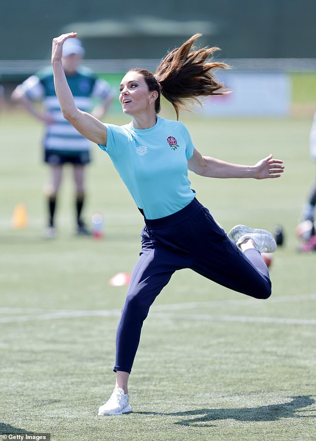 The most graceful rugby player ever? Kate looked ballerina-like as she got stuck in with exercise drills on the pitch at Maidenhead Rugby Club this afternoon
