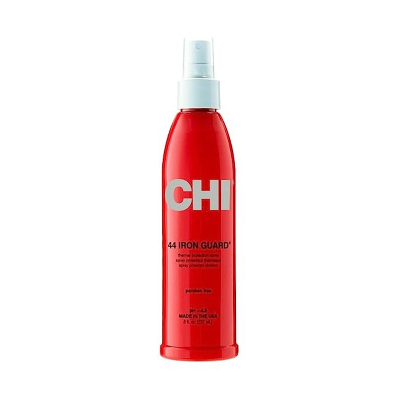Eine rote Flasche des CHI 44 Iron Guard Wärmeschutzsprays auf weißem Hintergrund 