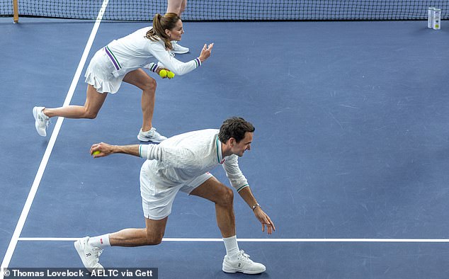 Kate pictured with Roger Federer as they played on Wimbledon's Number 3 court last month