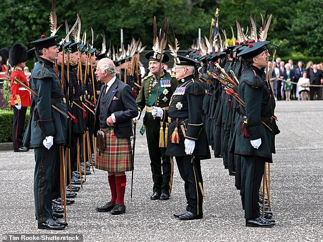 As part of the Ceremony of the Keys (pictured), the King is welcomed into the city of Edinburgh, His Majesty's 'ancient and hereditary kingdom of Scotland', by the Lord Provost, who offers him the keys of the city
