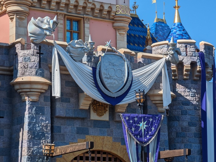 Disney 100 decor on Disneyland castle taken with Google Pixel Fold telephoto lens.