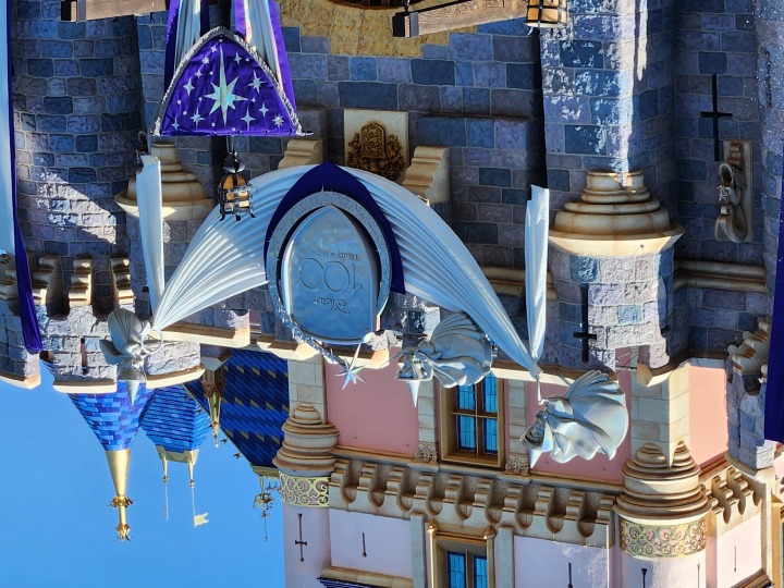 Disney 100 decor on Disneyland castle taken with Samsung Galaxy Z Fold 4 telephoto lens.