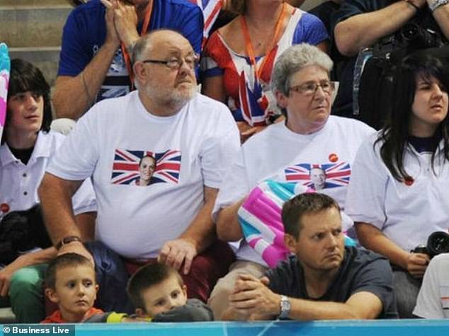 Proud: Ellie has often talked about her parents Val and Steve as her biggest supporters but never before revealed how the couple, who have four other children, adopted her as a baby (pictured at the 2012 Olympics)