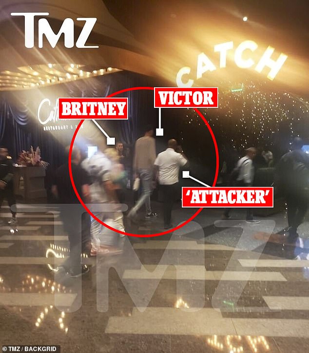 Moment: Britney was pictured moments before being 'slapped in the face'