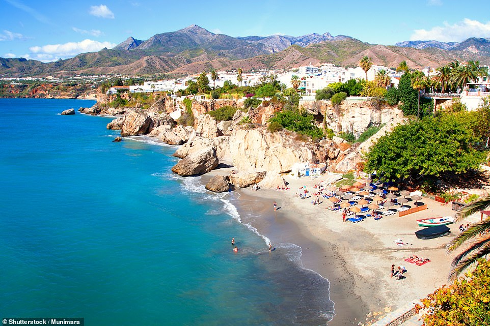 Among the high-scoring destinations on the Costa del Sol is Nerja (seventh, 83 per cent), pictured here, and described by Which? as 'a low-rise town of white-washed buildings perched on the cliffside'