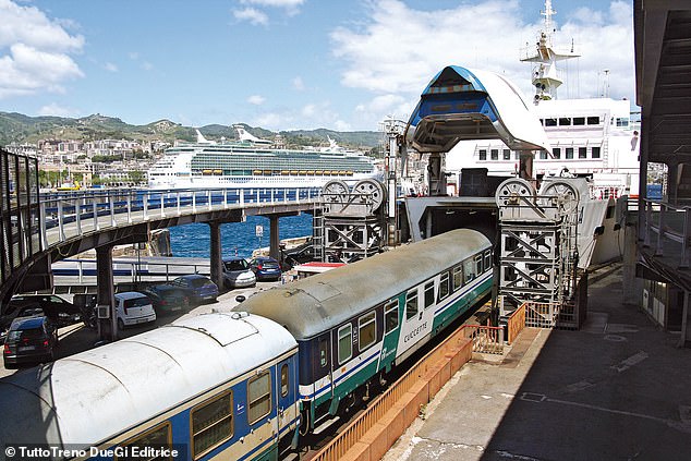 Those who do the train-ferry journey regularly 'must despair at the inefficiency' of the system, says Carlton, who adds: 'Transferring to identical carriages on the other side of the water would be far simpler.' Above is a file image