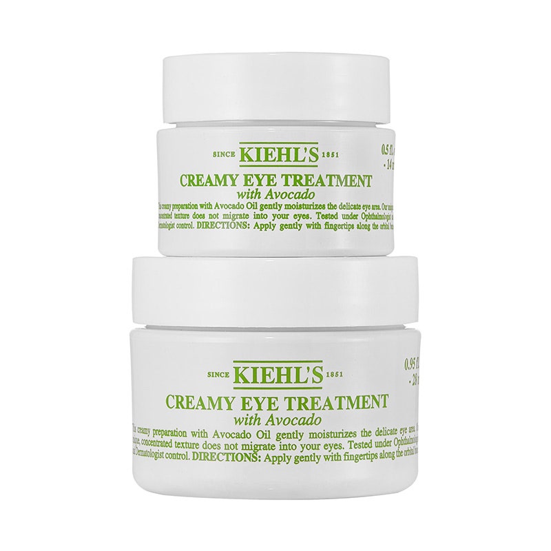 Zwei weiße und grüne Gläser der Kiehl's Creamy Eye Treatment mit Avocado auf weißem Hintergrund