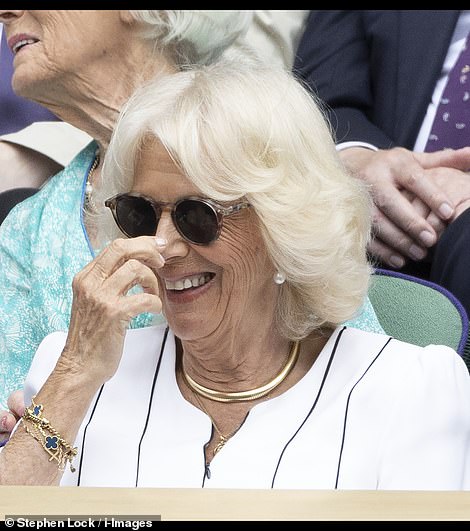 Camilla beamed as she watched the match, in her first solo Wimbledon appearance since becoming Queen