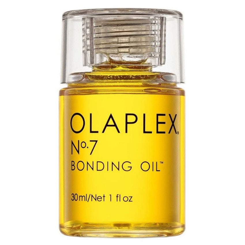 Olaplex No.7 Bonding Oil Flasche gelbes Haaröl auf weißem Hintergrund