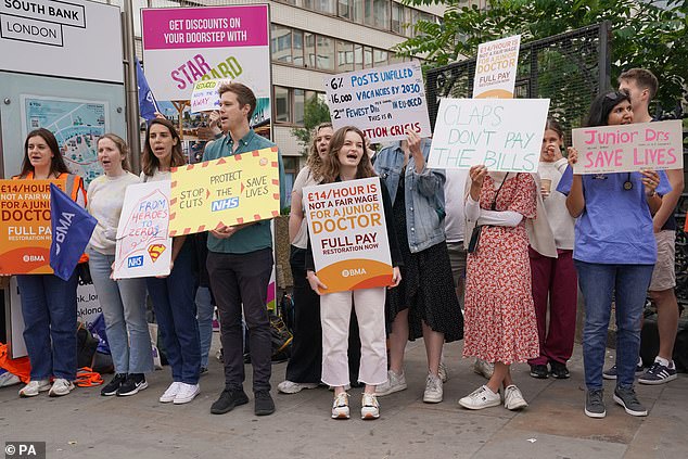 Junior doctor members of the British Medical Association on the picket line outside St Thomas' Hospital in London on July 13, at the start of a five-day strike amid the continuing dispute over pay