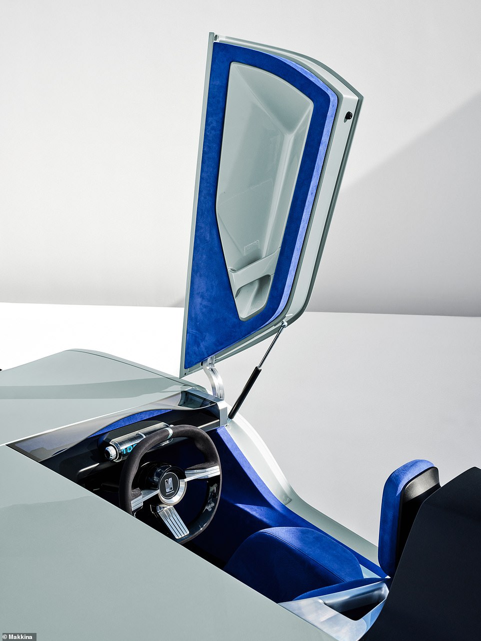 Inside, the cabin is as minimalist as the exterior body. Makkina says the cockpit 'aims to place the driver in a setting where there are no unnecessary distractions' to 'allow for the enjoyment of a pure driving experience'